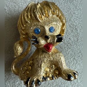 Gold and Black Cat Figurine with Blue Accents